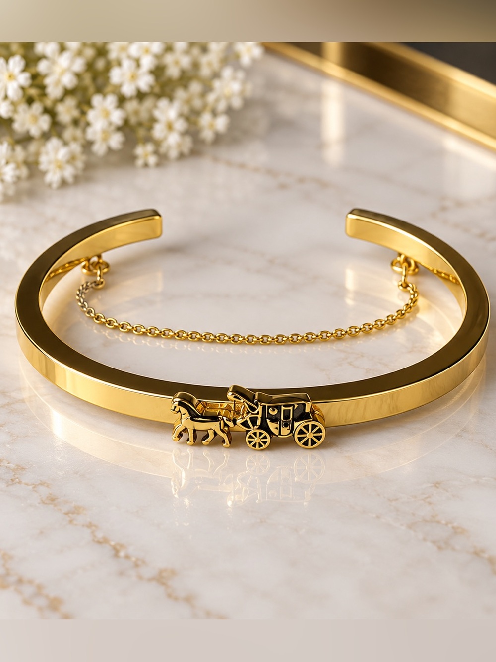 Coach Gold-Tone Horse & Carriage  Bangle